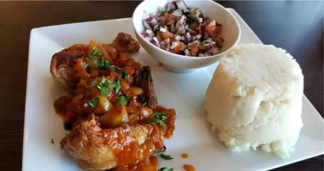 Ugali served with stew, a Tanzanian staple food