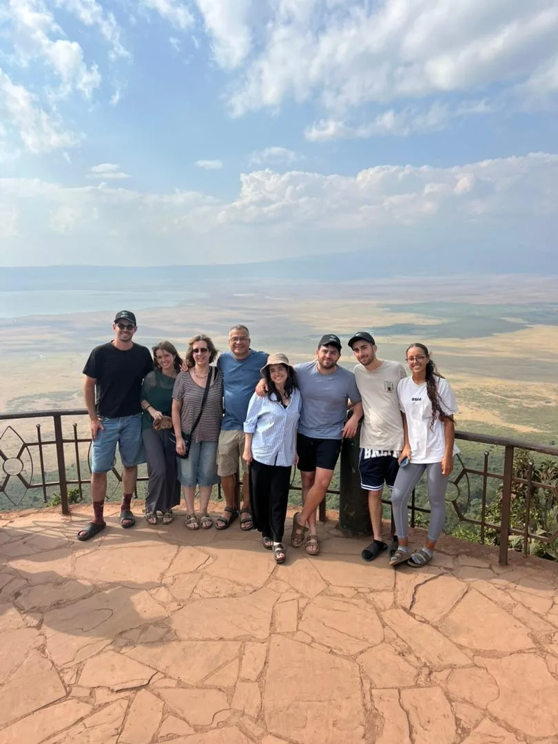 Family on safari watching elephants
