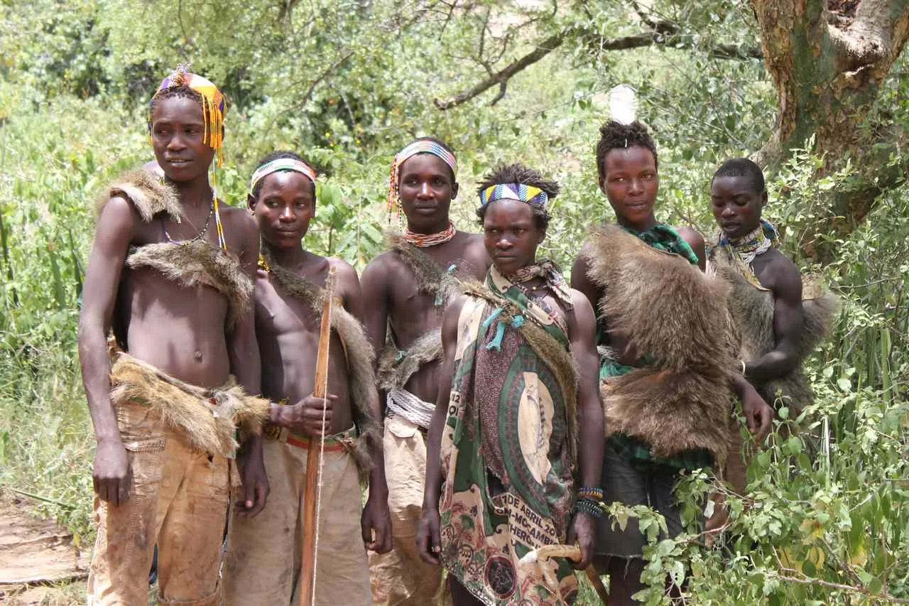 Hadzabe tribesman demonstrating traditional hunting techniques